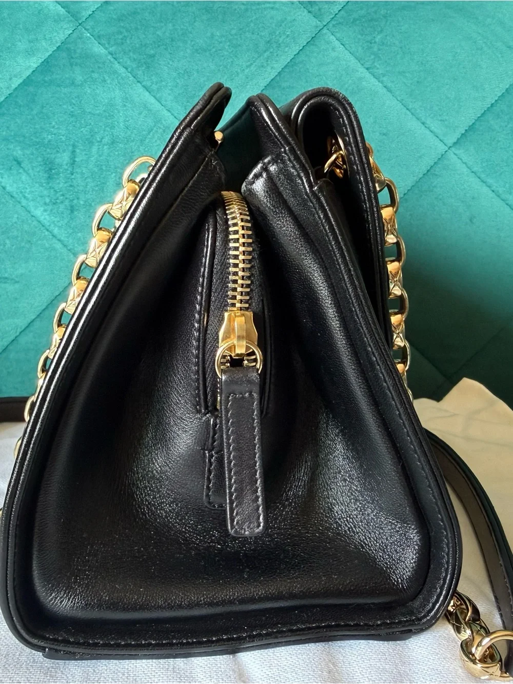 CHANEL Black Quilted Leather Shoulder Bag with Gold Hardware